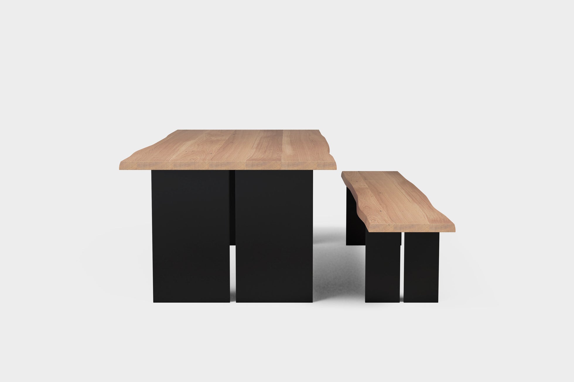 3 cm leg gap adds visual lightness to bold steel base.