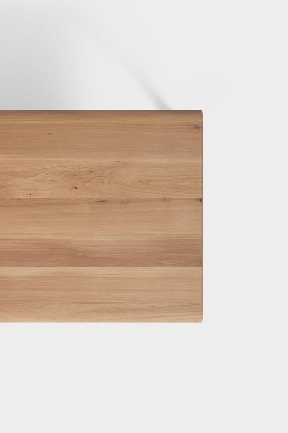 Extension plates stored inside the table for seamless function.